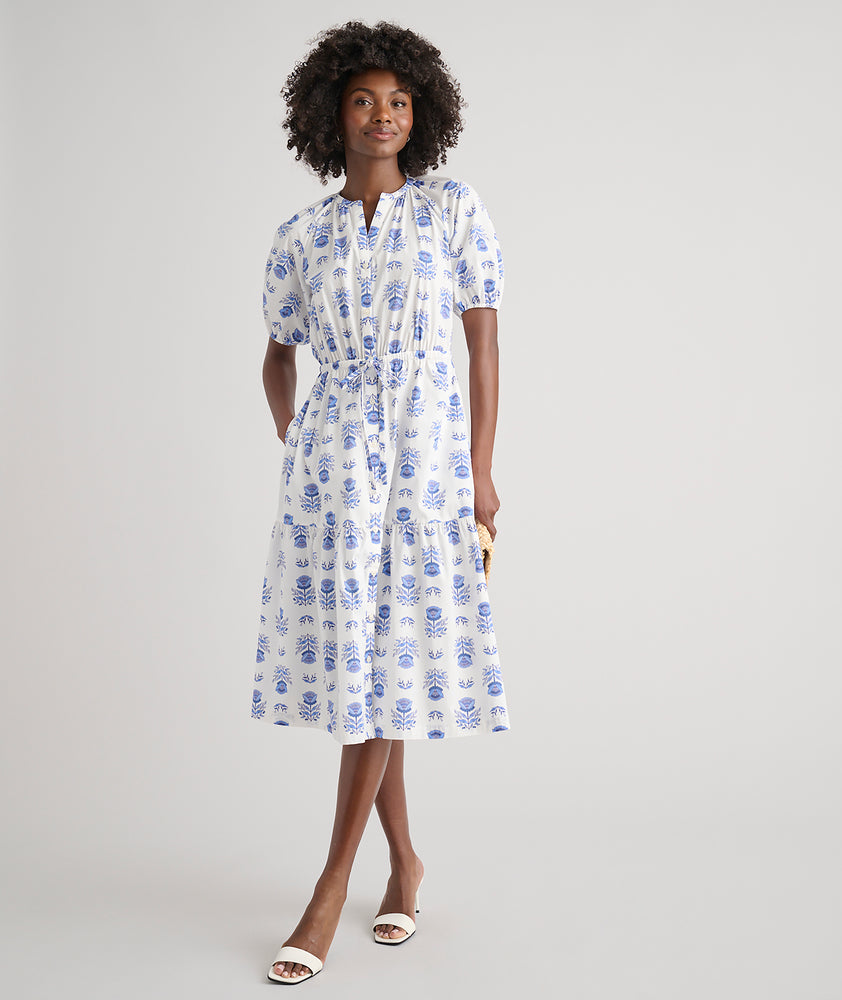 Model is wearing UNTUCKit Brigitte dress in floral white print. 