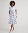 Model is wearing UNTUCKit Brigitte dress in floral white print. 