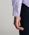 Model is wearing UNTUCKit Burke shirt in purple. 