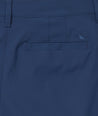 Model wearing UNTUCKit True Navy Traveler Shorts.
