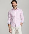 Model is wearing UNTUCKit Douro wrinkle-free shirt. 