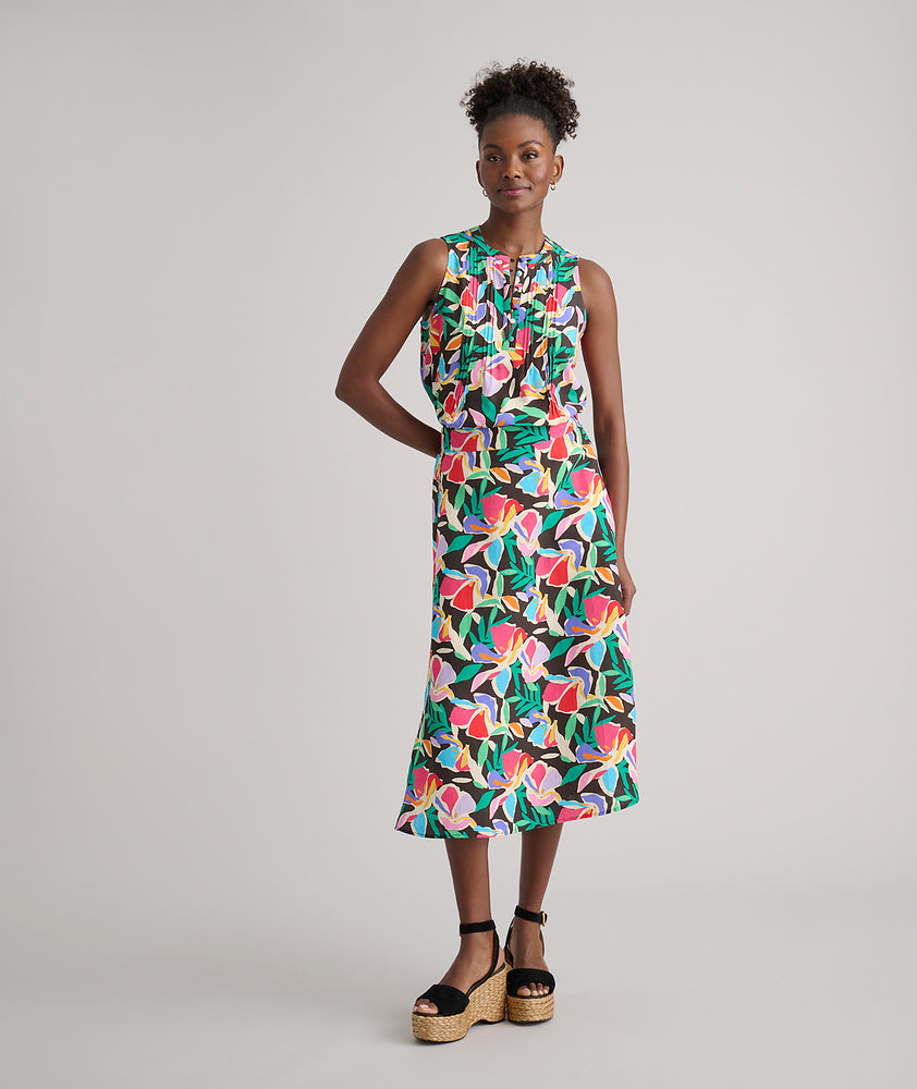 Model is wearing UNTUCKit Frida shirt in printed floral.