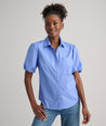 Model is wearing UNTUCKit Gail shirt.
