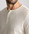 Model is wearing UNTUCKit Marastina henley in Vanilla Ice.