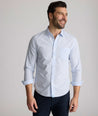 Model is wearing UNTUCKit Halstead wrinkle-free shirt.