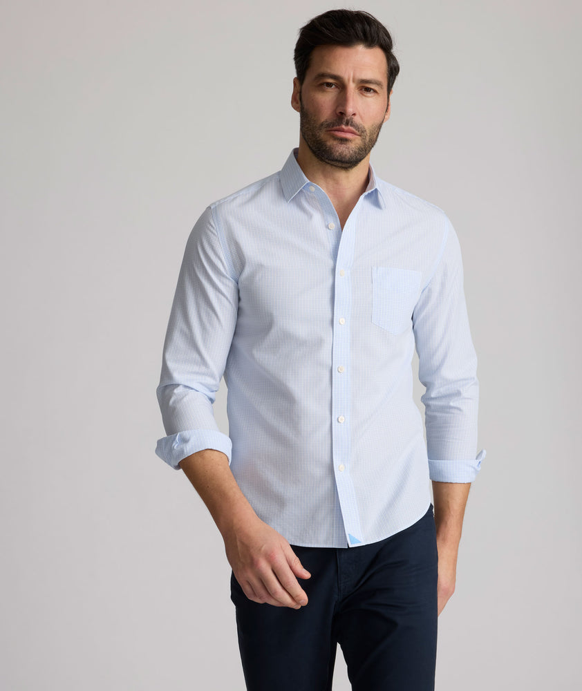Model is wearing UNTUCKit Halstead wrinkle-free shirt.