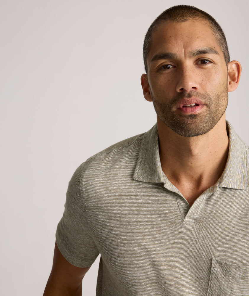 Model is wearing UNTUCKit Jacob Johnny Collar in Winter Moss.