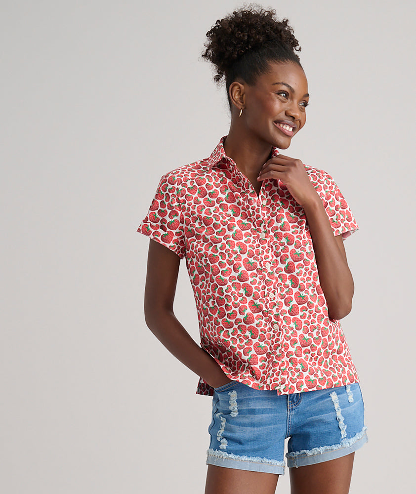 Model is wearing UNTUCKit Jamie shirt in strawberry print. 