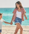 Model is wearing UNTUCKit Jamie shirt in strawberry print. 