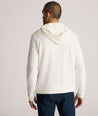 Model is wearing UNTUCKit Slub Cotton Hoodie in Off-White egret.