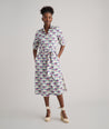 Model is wearing UNTUCKit Peyton dress.