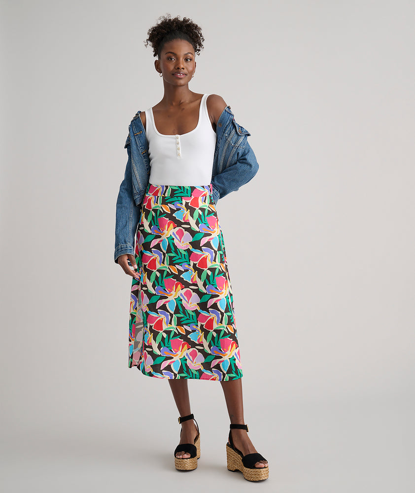 Model is wearing UNTUCKit pippa skirt in printed floral.