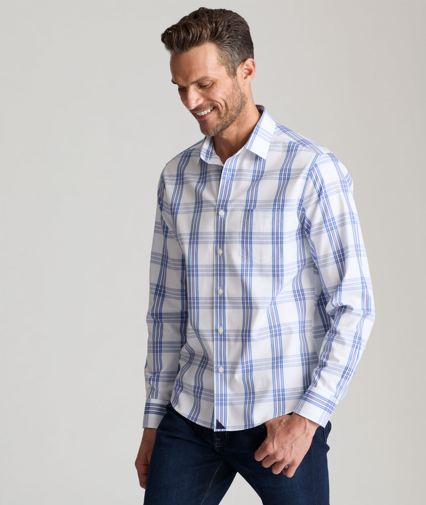 Model is wearing UNTUCKit Samson wrinkle free shirt. 
