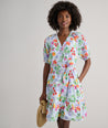 Model is wearing UNTUCKit Sierra dress in fruit print.