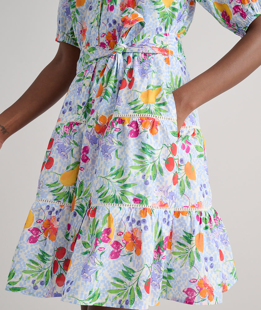 Model is wearing UNTUCKit Sierra dress in fruit print.