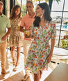 Model is wearing UNTUCKit Sierra dress in fruit print.